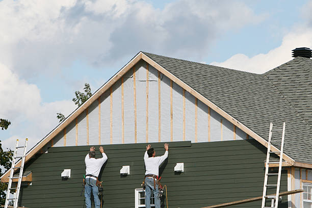 Professional Siding Contractor technician working in Roanoke, IN